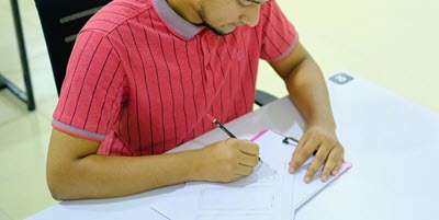 Person filling out document